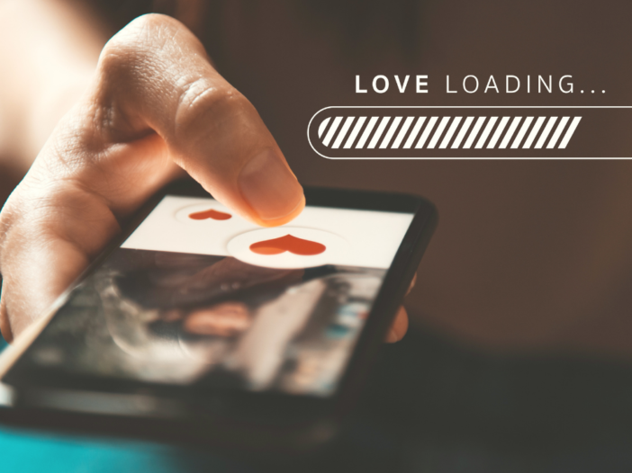 smartphone met dating app en de tekst 'Love loading'